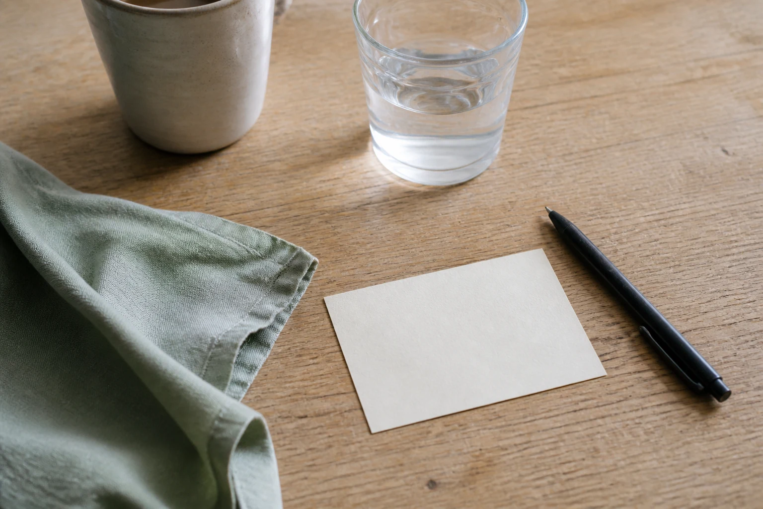 A quiet tabletop prepared for a private everyday-care conversation